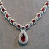 red gemstone necklace
